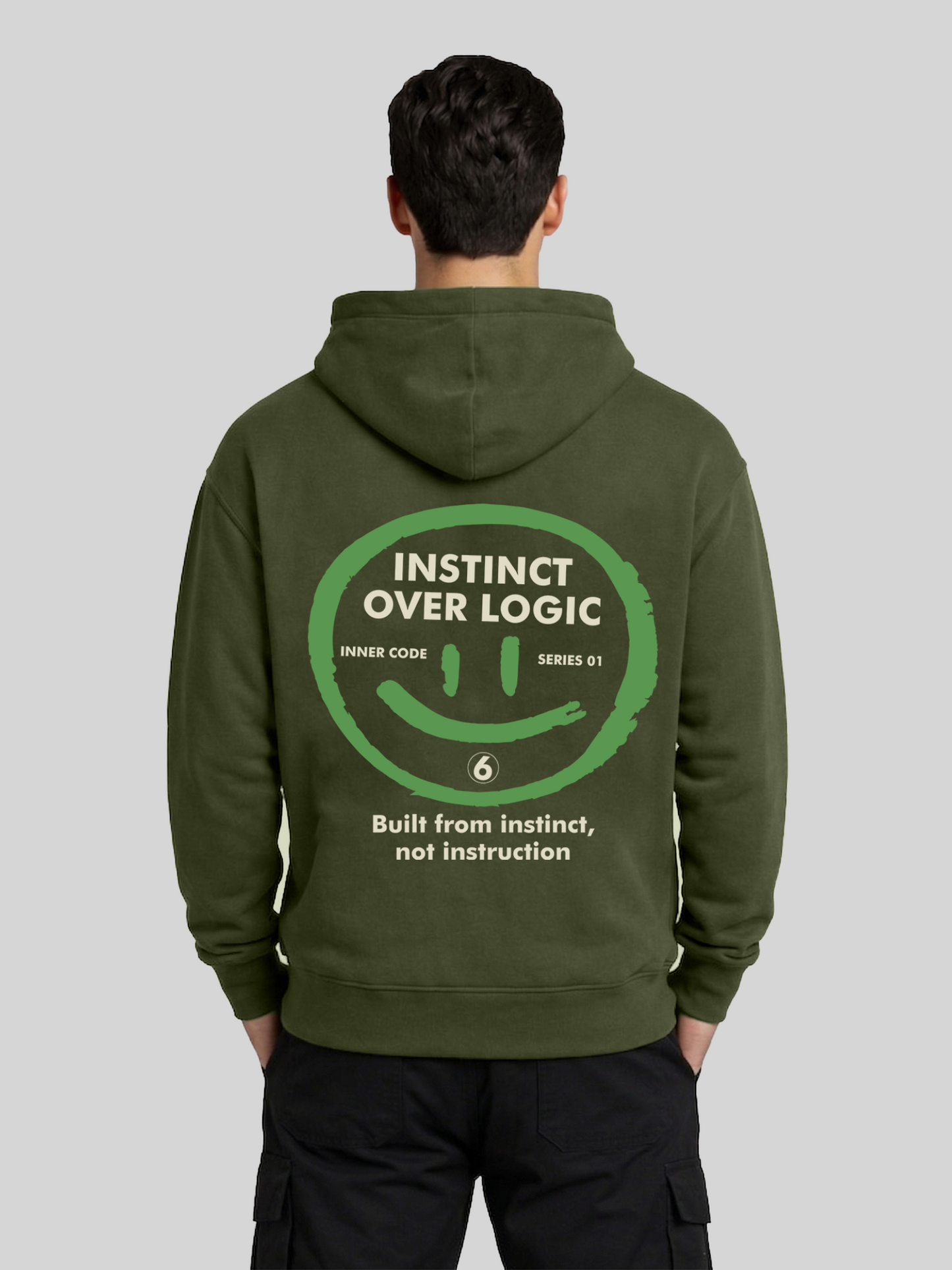 Instinct Over Logic military green graphic hoodie for men back view with bold back print