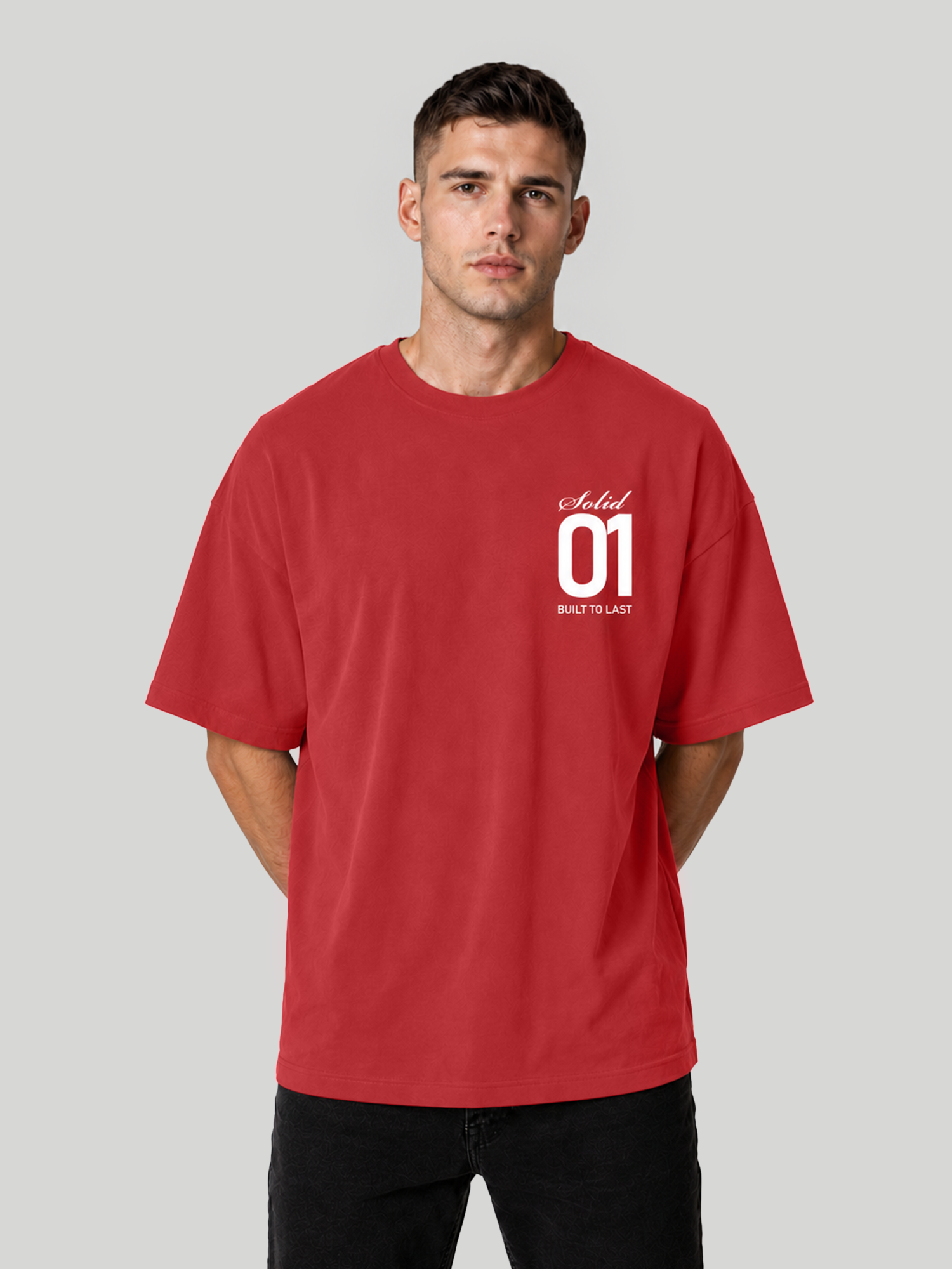 Men's Red Oversized T-Shirt Hands Behind Back Pose – Relaxed Fit Cotton Tee