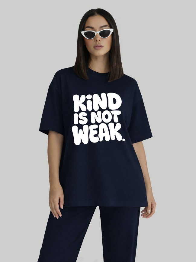 Women’s navy blue oversized graphic t-shirt with Kind Is Not Weak slogan front view