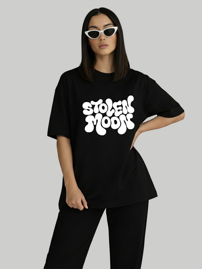 Women’s black oversized graphic t-shirt with Stolen Moods print angled front view