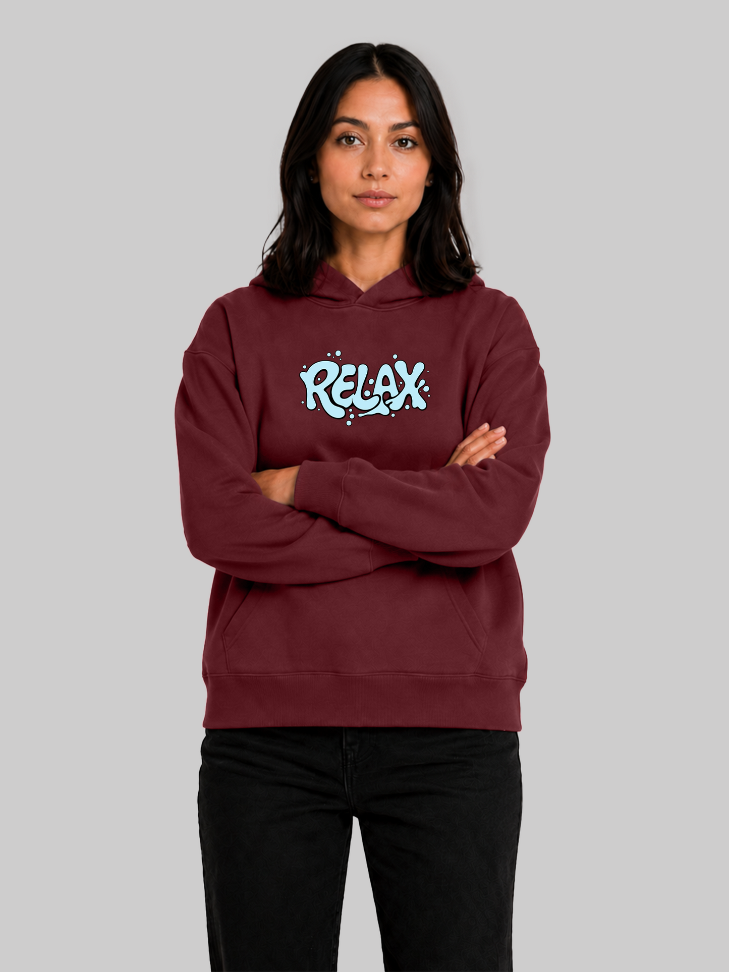 Maroon women's RELAX graphic hoodie with crossed arms and modern casual style