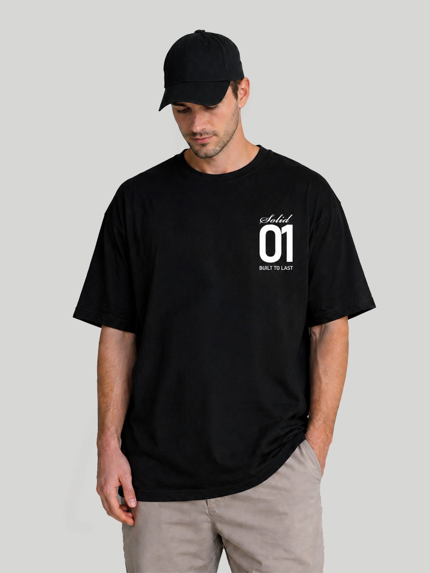 Men's Black Oversized T-Shirt Looking Down Pose – Relaxed Fit Casual Cotton Tee
