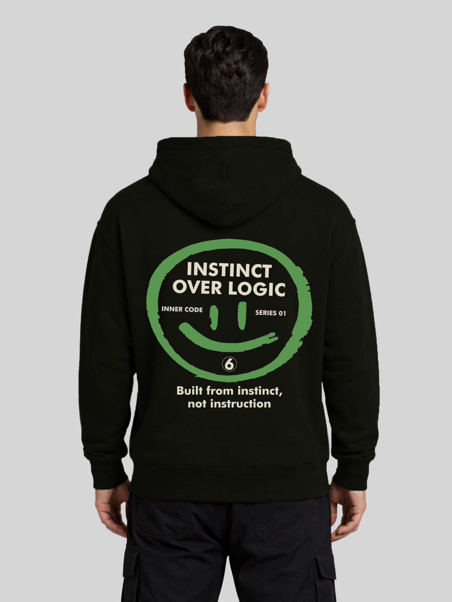 Instinct Over Logic black graphic hoodie for men back view with bold statement print