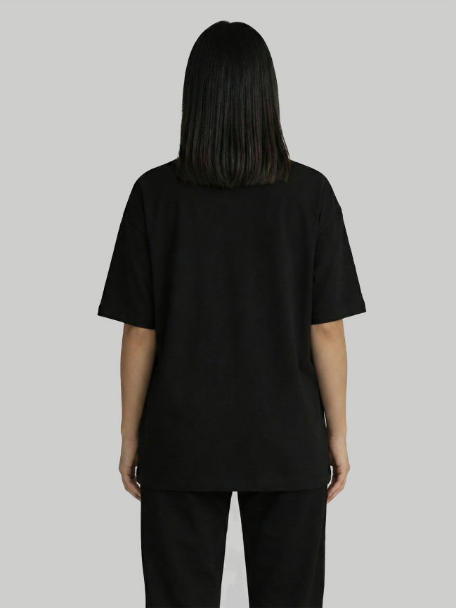 Back view of black oversized t-shirt for women with loose relaxed fit