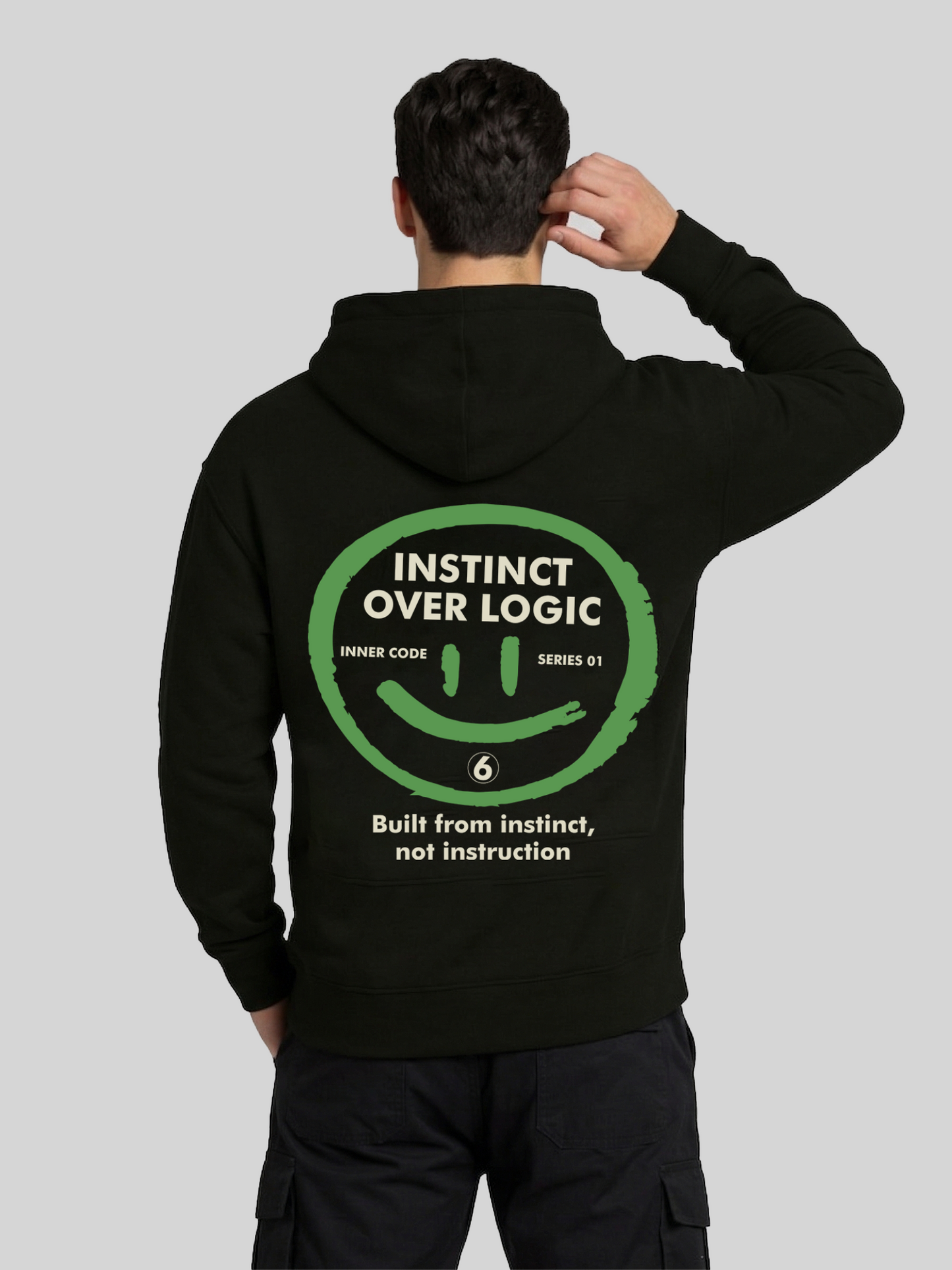 Instinct Over Logic black hoodie for men back view with bold graphic print and regular fit