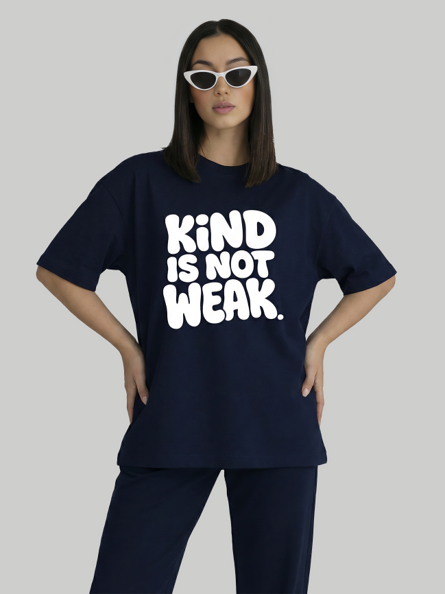 Model wearing navy blue oversized graphic tee for women with bold motivational text