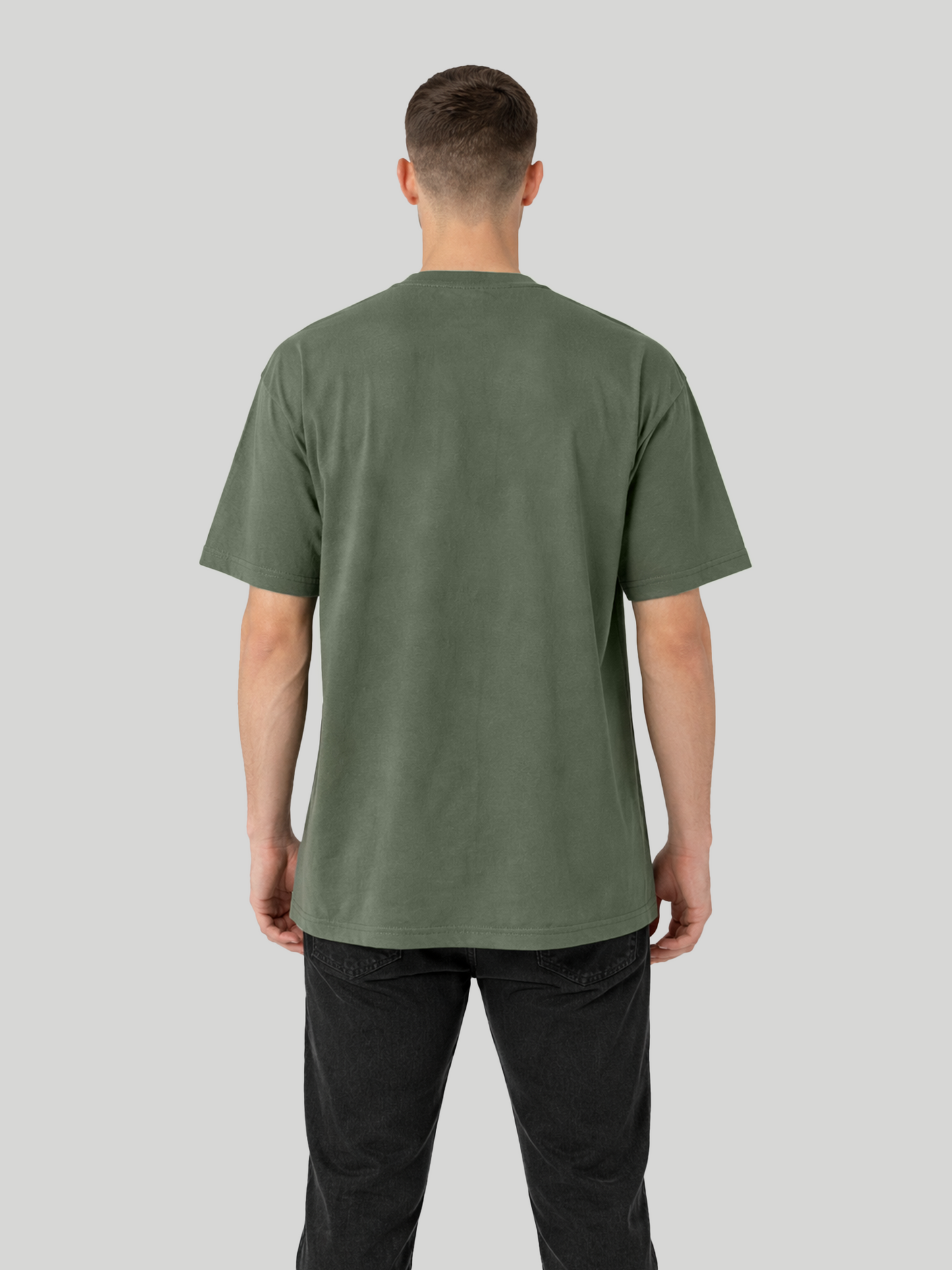 Back view of man wearing cypress oversized t-shirt with plain back design