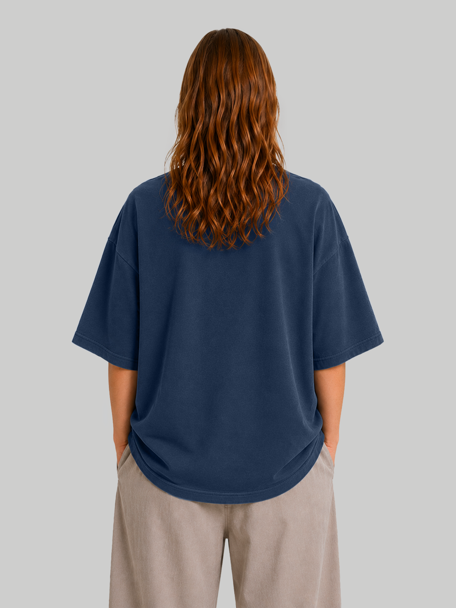 Back view of women's oversized navy blue t-shirt on model.