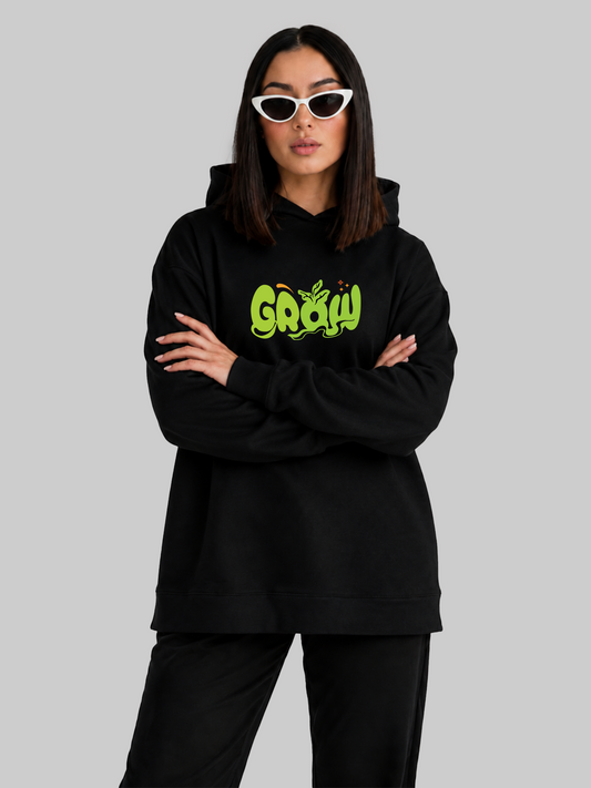 Black Grow Graphic Oversized Hoodie Arms Crossed Pose